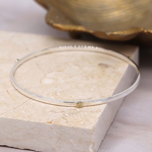 Sterling Silver Bangle with Brass Flower by Peace of Mind